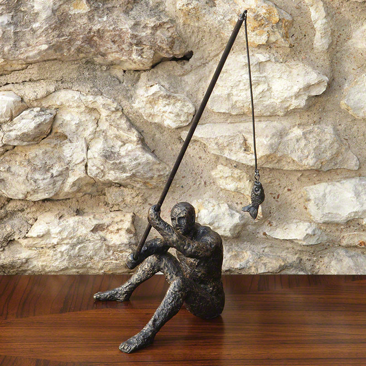 "Reel It In" Fisherman Sculpture