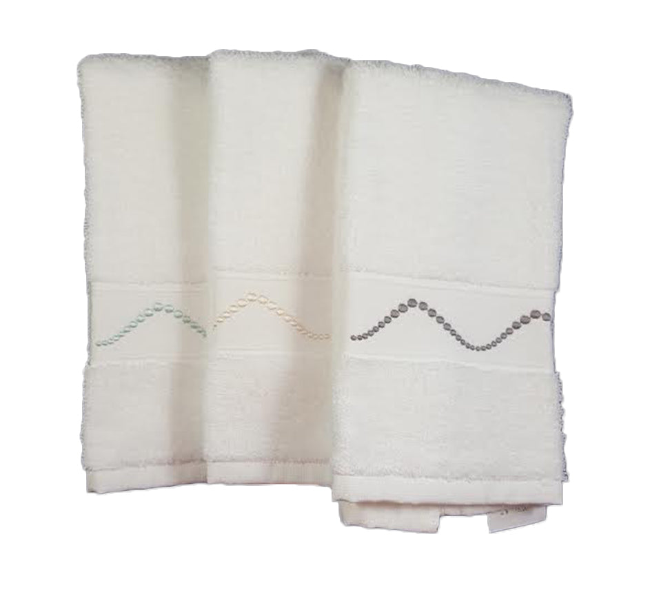 Olivia Guest Towel In White Ivory